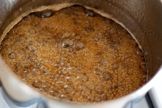 Boiling maple syrup for homemade maple cream reaching 235F