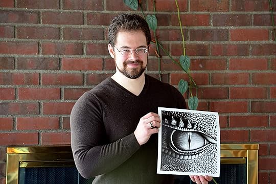 Christopher Paolini holding his print of Saphira's Eye.