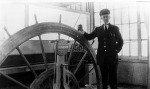 Pilot Edgar Brookhart in the pilothouse of the Queen City, 1910