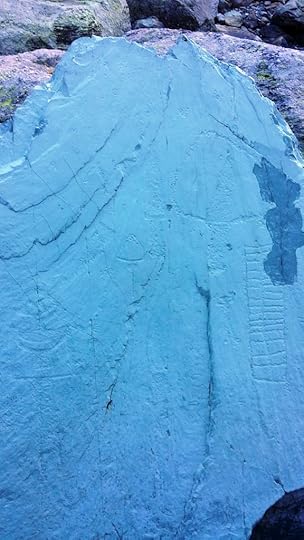 Petroglyphs in la Vallée des Merveilles; the ladder-like shape at the right may indicate fields