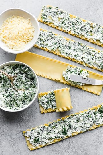 These EASY Spinach Lasagna Roll ups are totally delicious, perfect for entertaining or serving for weeknight meals. Individual vegetarian lasagnas filled with spinach and cheese are family-friendly, satisfying and perfect for portion control. It's also a great way to get your kids to eat spinach and no one will miss the meat!