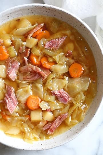 If you're making a big bone-in ham for the holidays this year, don’t throw away the leftover ham bone once all the meat’s been cut off. It’s a key ingredient in this soup that adds instant flavor with minimal effort! Here I added some vegetables, potatoes and cabbage, there are no beans but you can add some if you wish. So delicious and easy to make!