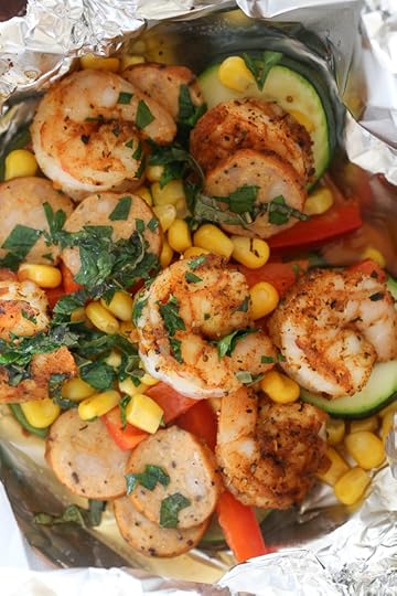 Cajun Shrimp foil packets are so easy to make, anyone can do it! Spicy shrimp seasoned with Cajun spices, Andouille sausage, and rainbow colored vegetables are baked together in foil pouches. They are fast and easy to make, and can be made ahead and kept in your freezer. When you're ready to cook them, just pop them in the oven – perfect for busy weeknights!