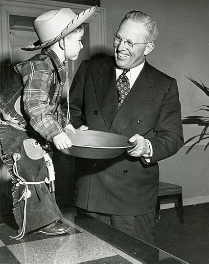 California Governor Earl Warren with a small boy dressed as a prospector, during the California Centennial Celebration, 1948-50 (California State Archives)