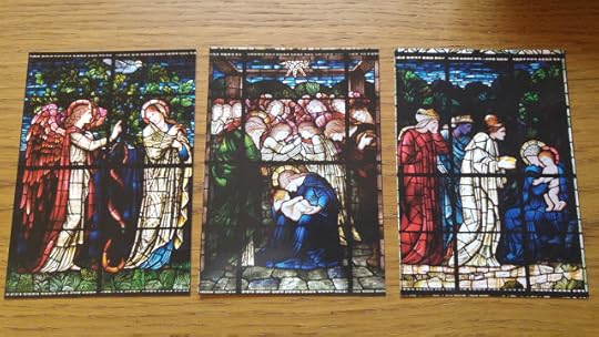 photo of postcards of stained glass window nativity scenes