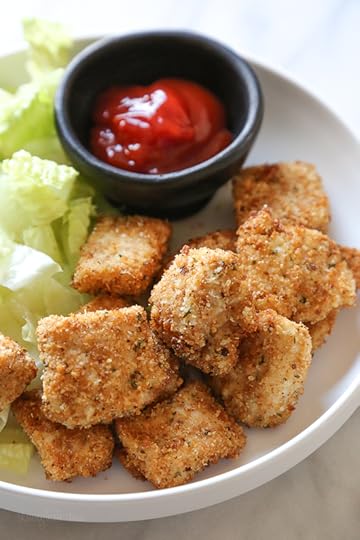 Making homemade Chicken Nuggets in the air-fryer is so much healthier than fast food or frozen nuggets, and so easy to make. Made with chunks of chicken breasts coated in breadcrumbs and parmesan cheese then air fried until golden and crisp. These also happen to be egg-free, so they are also great for kids with egg allergies. 