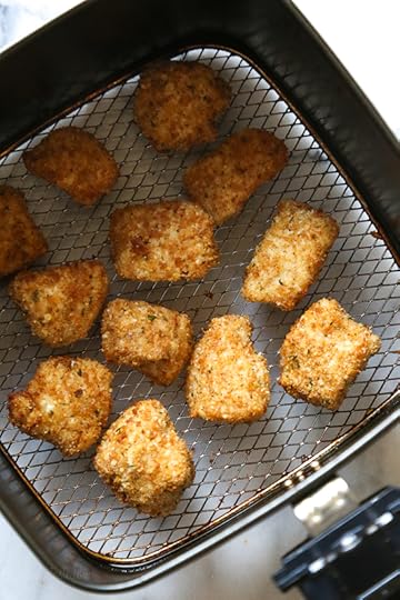 Making homemade Chicken Nuggets in the air-fryer is so much healthier than fast food or frozen nuggets, and so easy to make. Made with chunks of chicken breasts coated in breadcrumbs and parmesan cheese then air fried until golden and crisp. These also happen to be egg-free, so they are also great for kids with egg allergies. 