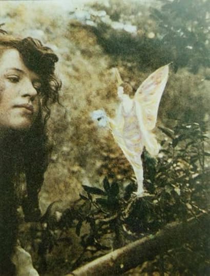 Elsie Wright as photographed by her cousin Frances Griffiths in 1920 with a "fairy"