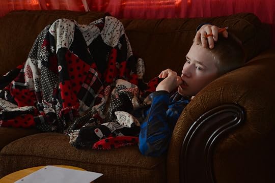 Noah's been fighting a cold for a few days. Nothing like snuggling on the couch in your pj's when you're sick. (And he was being a little creative, too--while watching Jabin play Halo.)