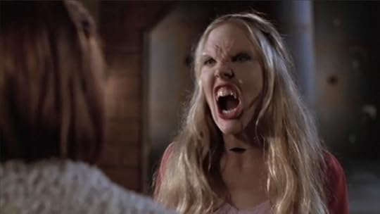 Harmony is all vamped out, mouth wide open and full of fangs.