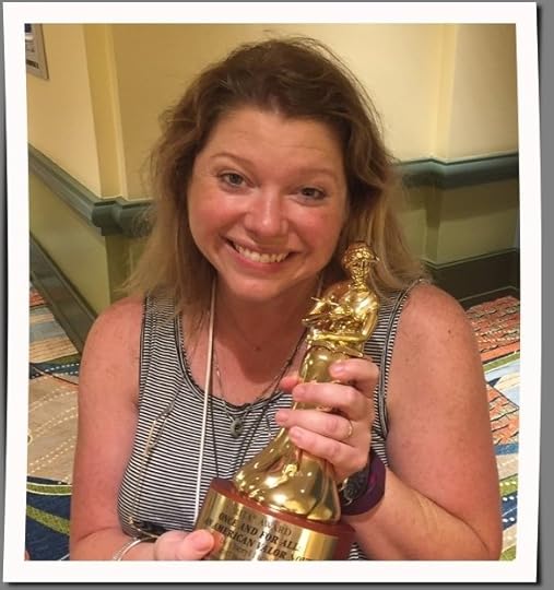 I mean, that's a statue that should be in a museum. Me with Cheryl Etchison's RITA award. For law of attraction purposes.