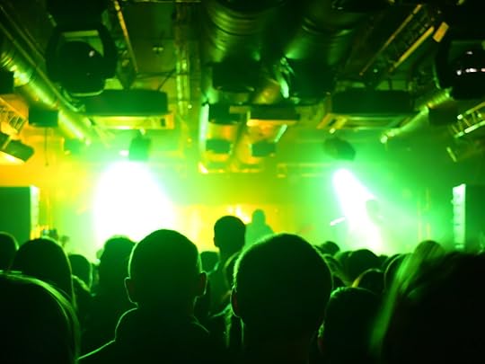 Proof that at every general admission show on every continent, the tallest guy in the room will always stand in the front, center so that everyone else may stare at his oddly shaped head for three hours.