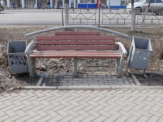 Perhaps a little passive aggression on the part of the sanitation department, but there is NO excuse to litter while seated at this bench. Also, note the presence of non-snowy ground. 