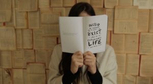 negative-space-woman-reading-philosophy-book-thought-catalog