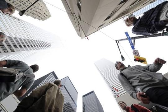 Sept. 26, 2008: Pedestrians cross the intersection of Bay and King streets in Toronto’s financial district. In 2008, a financial crisis began to close globalization in a steel trap of its own making.