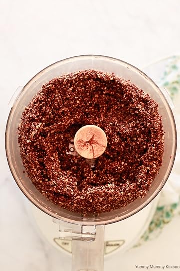 Bliss ball ingredients get blended in a food processor.