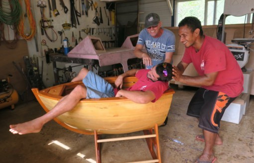 The carpenter Cyril trying out his last masterpiece - a boat shaped cradle