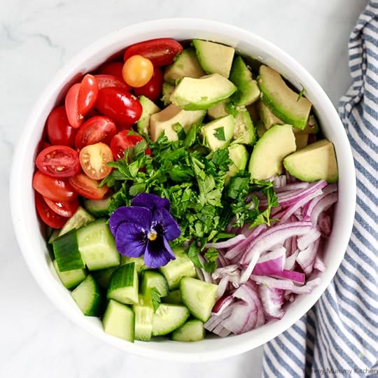 This avocado salad recipe is easy to make with just a few ingredients like cucumber, tomatoes, and avocado.