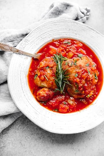 Pollo in Potacchio is an Italian braised chicken dish made with tomatoes, rosemary and garlic. The chicken cooks until it's fork tender, which is great served with pasta, noodles or polenta.