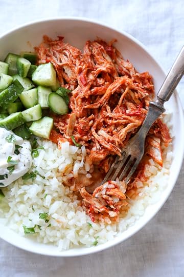 These easy Harissa chicken recipe can be made in the slow cooker or Instant Pot (pressure cooker) and can be served so many different ways! Made with just two ingredients – jarred Harissa and chicken plus some spices!