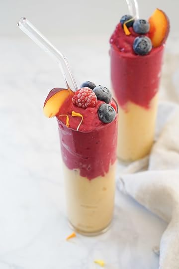 This beautiful pink and orange layered peach smoothie recipe is easy to make an filled with Vitamin C, antioxidants, and probiotics.