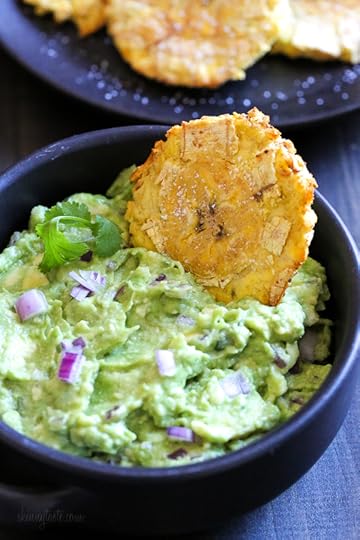 These easy tostones also known as patacones or fried green plantains are made healthier in the air fryer. No deep frying, just a few spritzes of olive oil for a crispy, delicious appetizer or side dish.