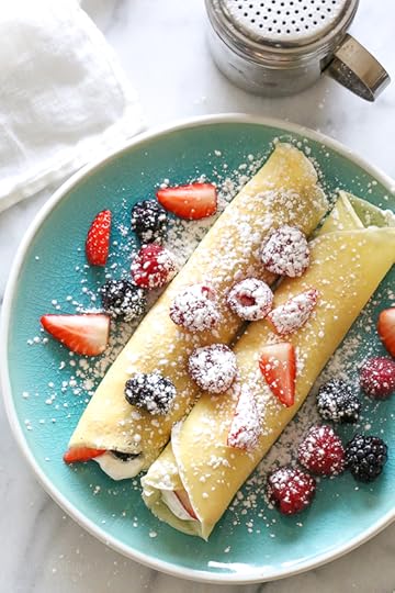 These blender crepes are so easy to make, and are perfect to serve for breakfast or dessert. They can be filled with fruit, jam, yogurt, ice cream, you name it!