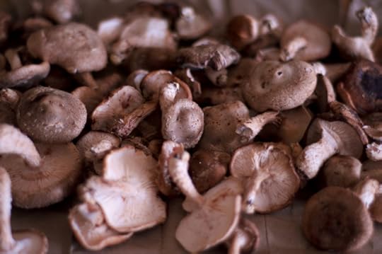 fresh shiitake mushrooms on a cutting board