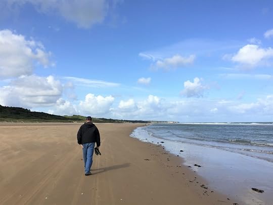 My husband walking west along Omaha beach at low tide, near Colleville-sur-Mer, France, September 2017 (Photo: Sarah Sundin)