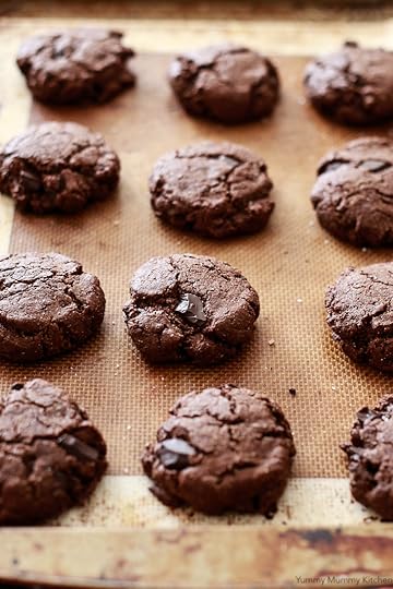 A sheet of freshly baked double chocolate almond flour cookies. These delicious cookies are vegan, paleo, and gluten-free.
