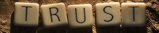 Scrabble letters spelling trust