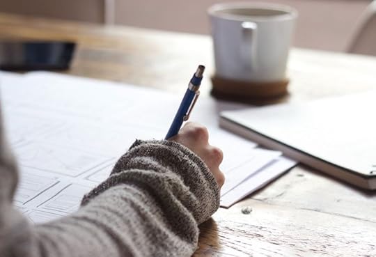 Person writing by green-chameleon