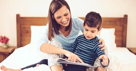 young-mom-reading-bedtime-story-to-son_573x300.jpg