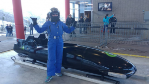 Lisa Niver riding the Olympic Bobsled in Utah