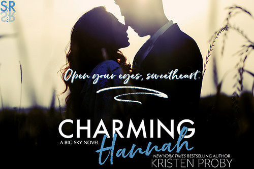 Evening sun shines over the silhouettes of wedding couple kissing in the field