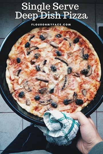 Single Serve Deep Dish Pizza served in a cast iron pan.