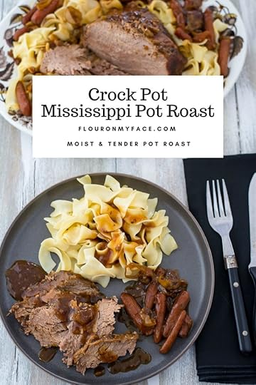 Tender and moist Crock Pot Mississippi Pot Roast on a grey dinner plate served with noodles and gravy.