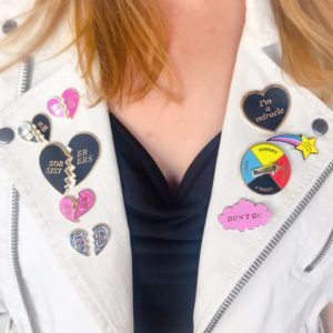 Show your recovery style with enamel pins.