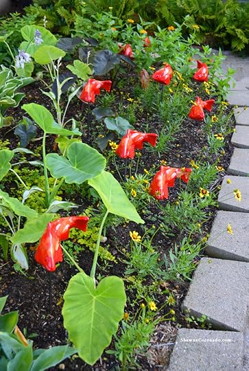 Fish in the garden sculptures vertical photo