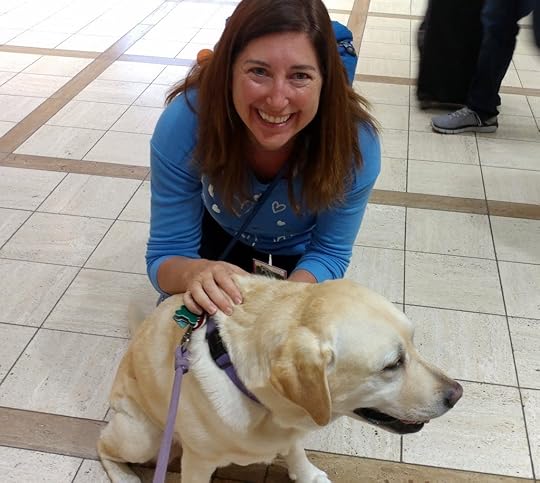 Lisa Niver with one of the LAX PUPS Therapy dogs