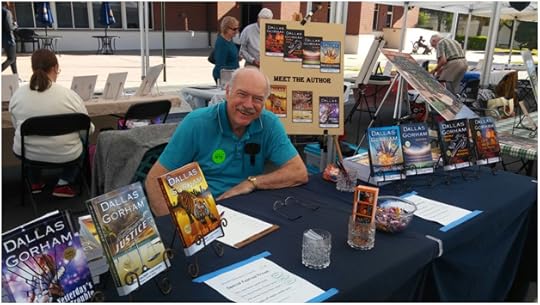 Dallas Signing Books at the Leesburg Art Fest