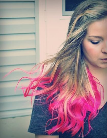 woman with blonde hair with pink ends