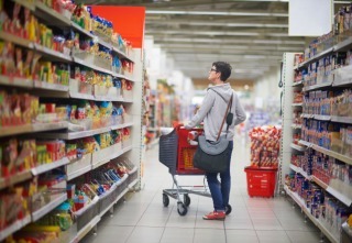 shopping woman in supermarket store buying food and grocery