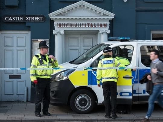 Police officers stand outside a branch of the Italian restaurant Zizzi where an ex-Russian spy and his daughter had dined before becoming ill. Picture: Getty Images