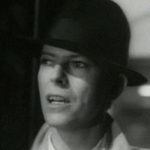 An image of David Bowie from the music video for Absolute Beginners