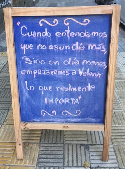 Sidewalk sign outside restaurant