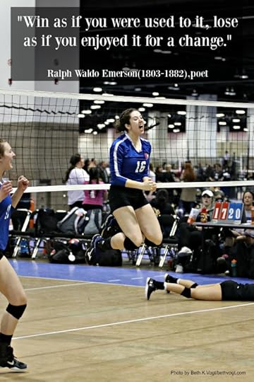 high school female volleyball player celebrating