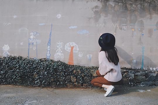 girl chalk painting on wall.jpg