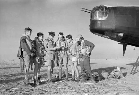 Crew of an RAF Wellington at Kairouan Airfield, Tunisia, being briefed before a bombing raid to Sicily, 9 July 1943 (Imperial War Museum)