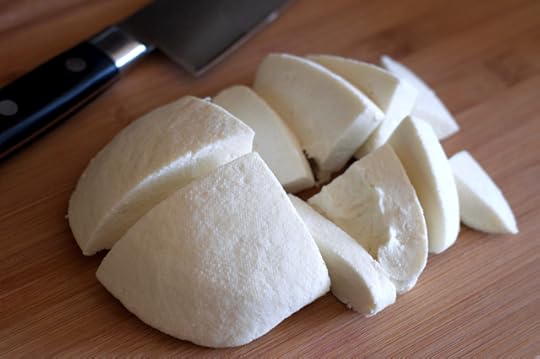 Slices of homemade paneer cheese
